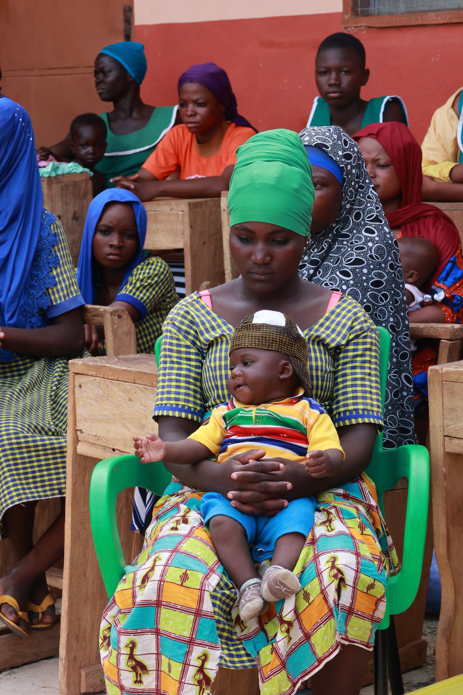 group-of-women-and- children-dressed- in-traditional-attire
